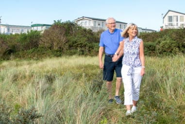 Couple walking hand in hand