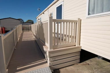 Wheelchair access ramps shown outside an accessible caravan