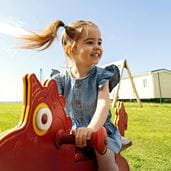 Child on rocking horse