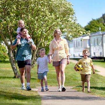Family walking on park