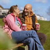 Couple sitting on bench