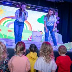 Children watching the entertainment on stage at Parkdean Resorts