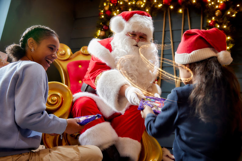Children meeting Santa at a Parkdean Resorts Winter Wonderland break