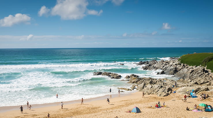 busy beach on beautiful day at Fistral beach