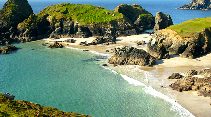 a deserted kynance cove on a sunny day