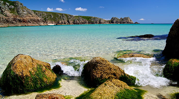 crystal clear waters at porth curno beach
