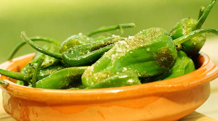 bowl of cooked green chillis