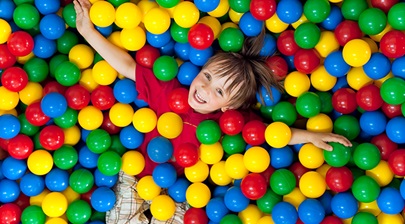girl in a ball pit
