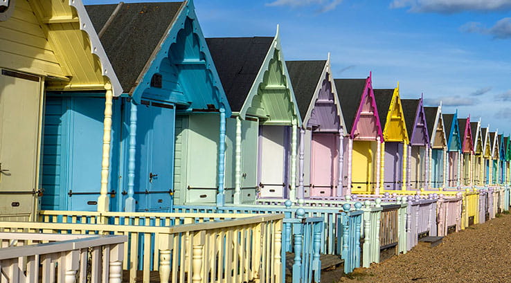 Colourful beach huts on Mersea Island, Essex