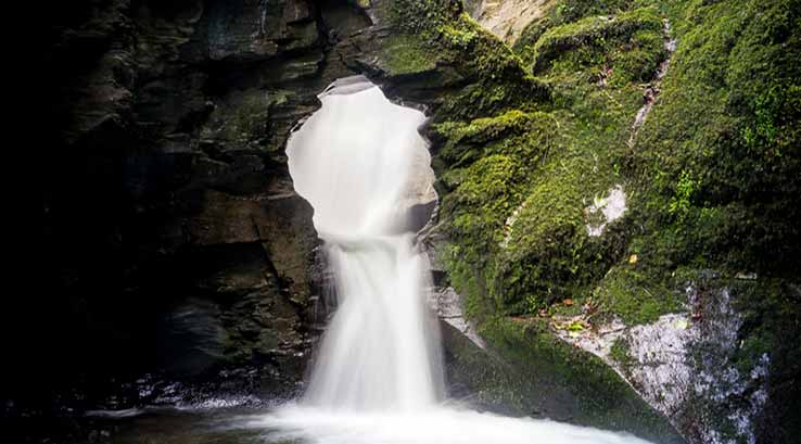 fast flowing water over a waterfall