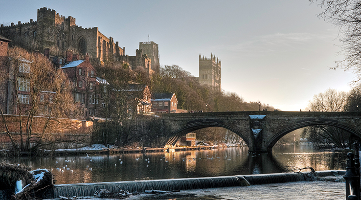 A view of Durham Castle and Cathedral from the river