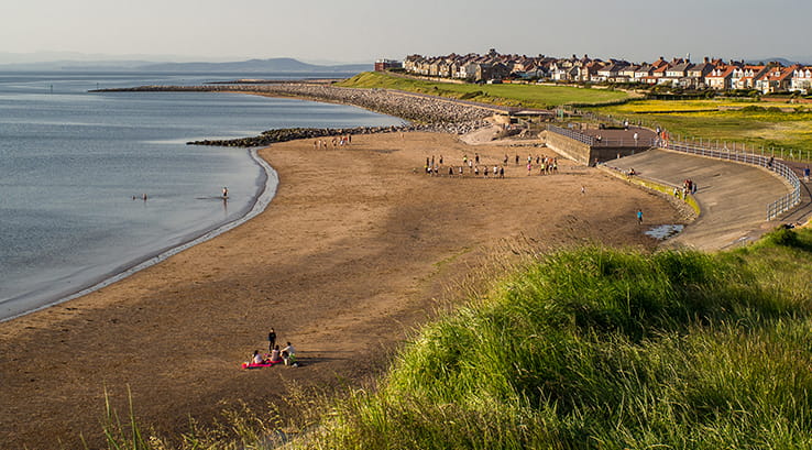 A view across the beach towards the town of Heysham