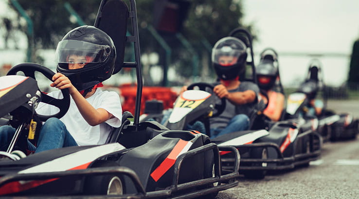 Kids karting on a race track