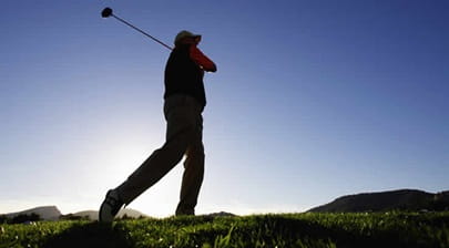 Man playing golf