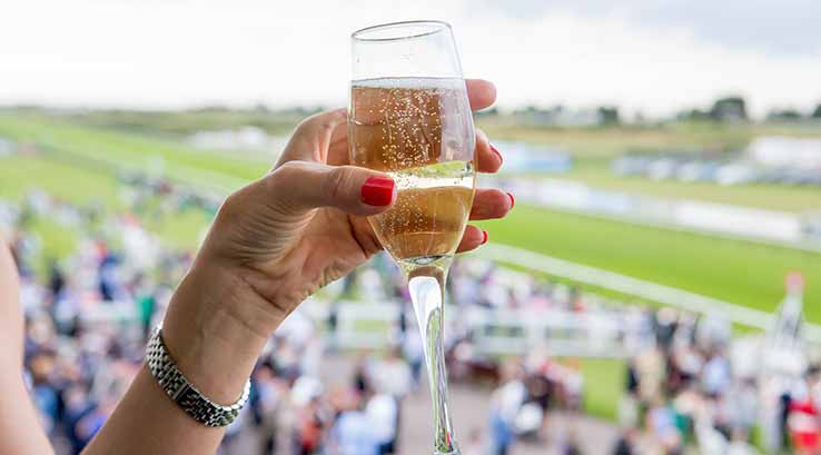 hand holding a glass of champagne