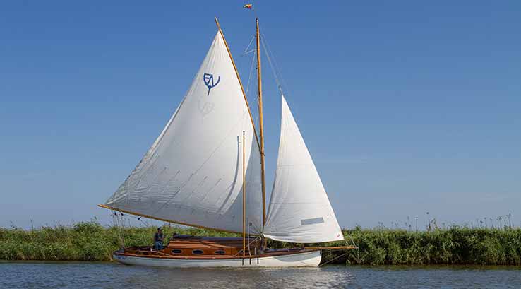 sail boat on a river