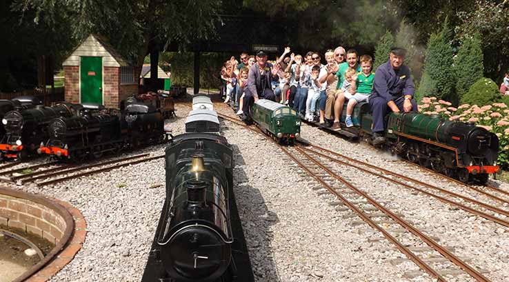 Riding miniature steam train