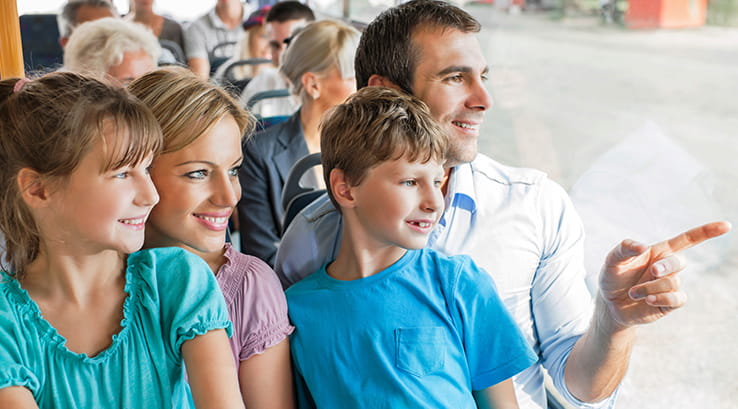 family on a sightseeing bus
