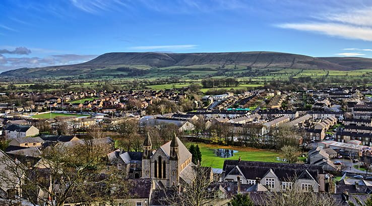 The town of Clitheroe with Pendle Hill in the distance
