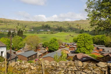 landscape shot of caravans overlooking breathtaking countryside