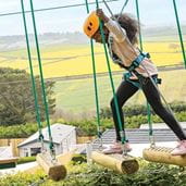 Kid on high ropes