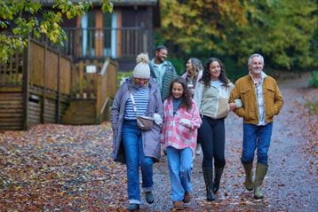 Family walking in forest