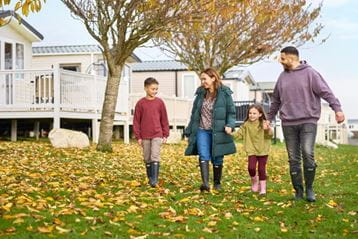 Family walking in forest