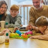 Family playing board games