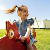 Child on toy horse