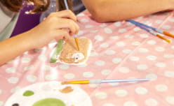 Children painting pottery