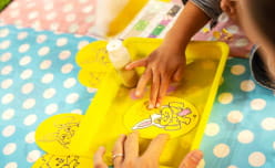 Children doing sand art