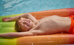 Child on pool lilo