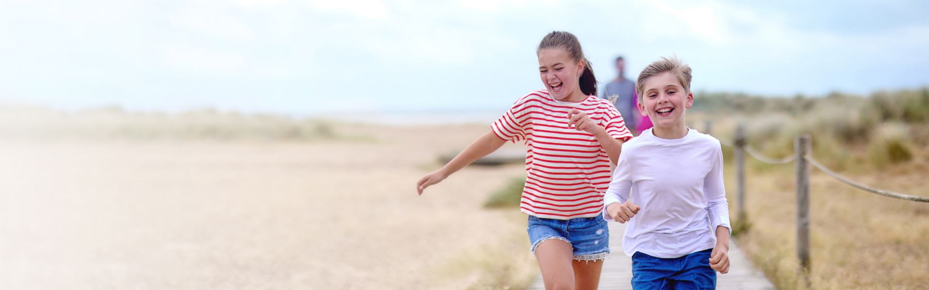 Children frolicking along path