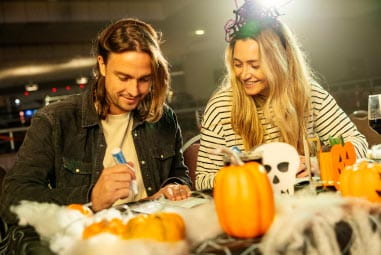 Family doing Halloween activities