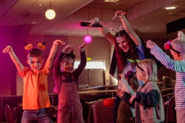 Children dancing in fancy dress