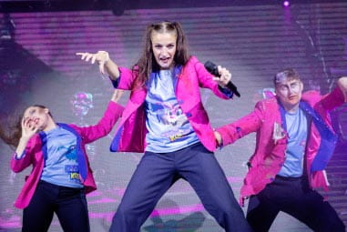 Performers dancing on stage