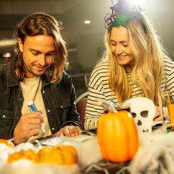 Couple taking part in a Halloween quiz