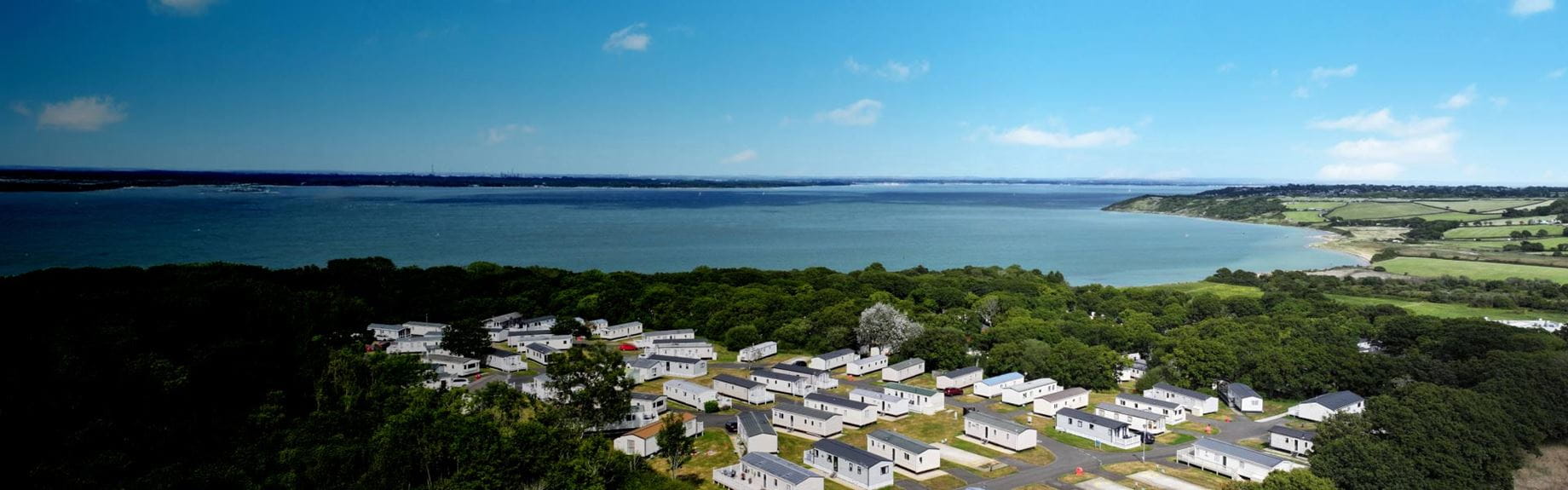 Birdseye view of caravans on the coast