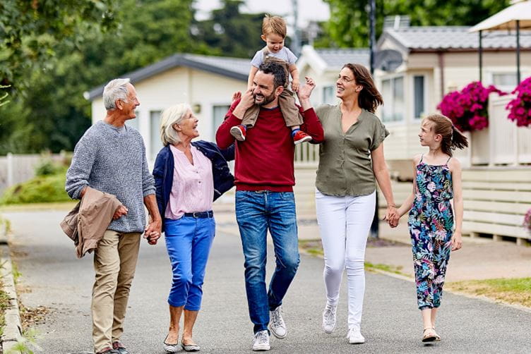 Family walking through parkdean resorts