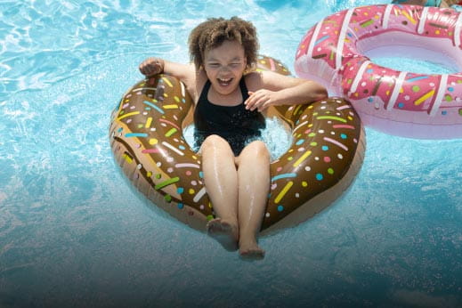 Child in donut inflatable
