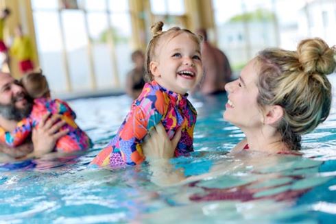 Mum and daughter in the swimming pool