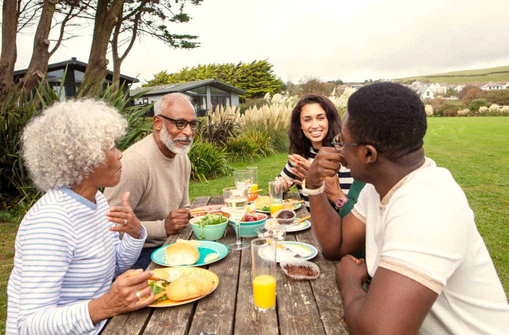 Group of friends at a table having lunch