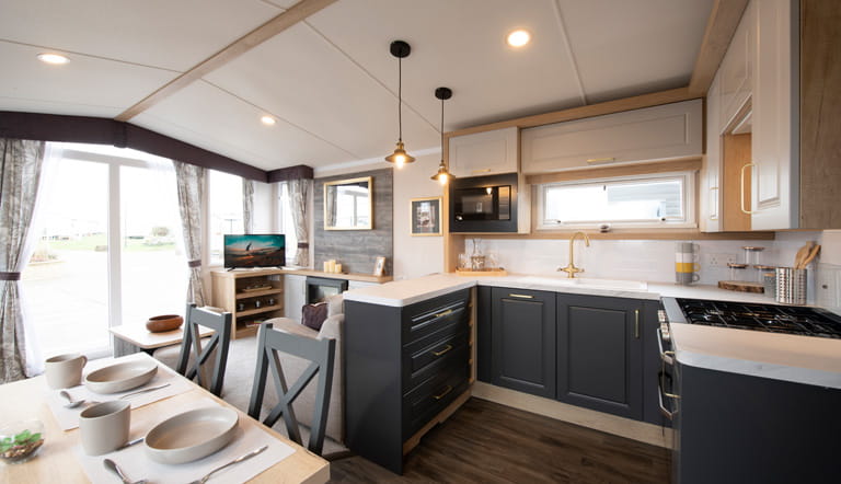 Kitchen and dining area in a Swift Bordeaux caravan