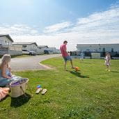 a family playing outside