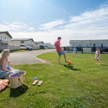 a family playing outside