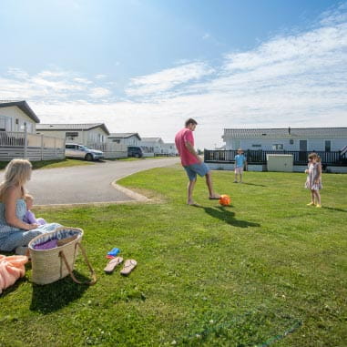 a family playing outside