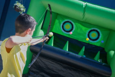 A child playing hover archery