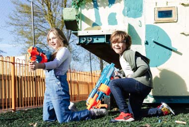 two children with water pistols
