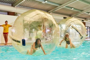 children in water walkers