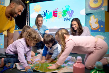 kids playing with slime and paint